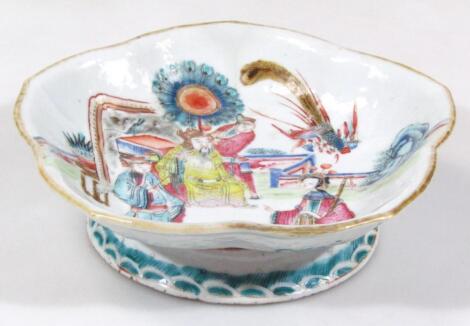 A Chinese semi-porcelain Kangxi style dish