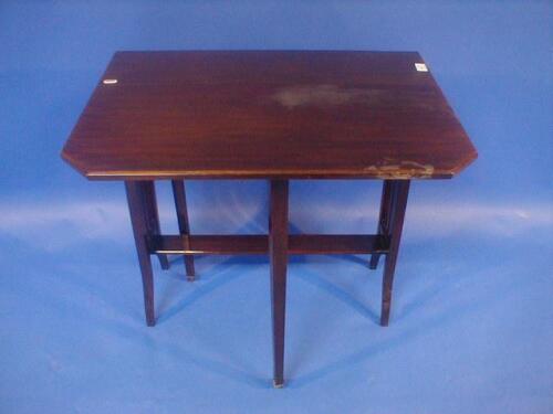 An Edwardian mahogany Sutherland table on square framing