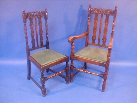 A set of six Jacobean style oak dining chairs with drop-in seats and bobbin turned framing