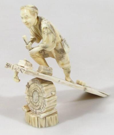 A Japanese Meiji period ivory figure group