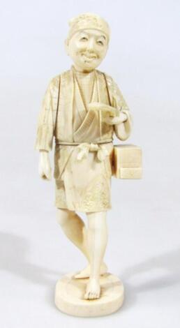 A Japanese Meiji period ivory figure