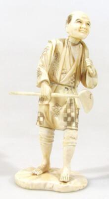 A Japanese Taisho ivory figure of a gentleman