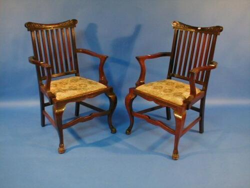 A pair of Chippendale style mahogany carver chairs with acanthus carved cresting rail