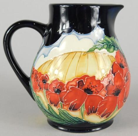 A Moorcroft pottery Forever England pattern jug