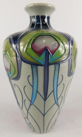 A Moorcroft pottery Peacock Parade pattern vase