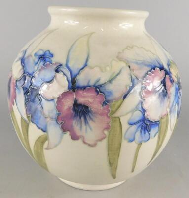 An early 20thC William Moorcroft Orchid pattern vase