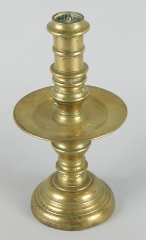 A late 17thC/early 18thC brass candlestick