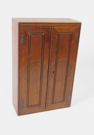 A Cuban mahogany cigar cabinet