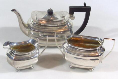 A George V harlequin three piece silver tea service