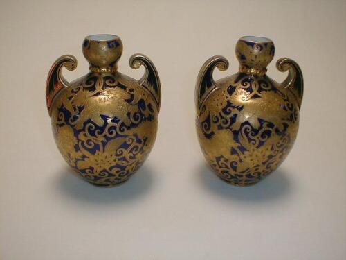 A pair of Derby porcelain ovoid vases