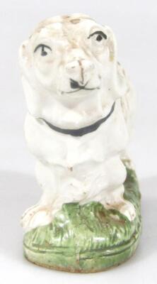 A 19thC pottery figure of a dog - 2