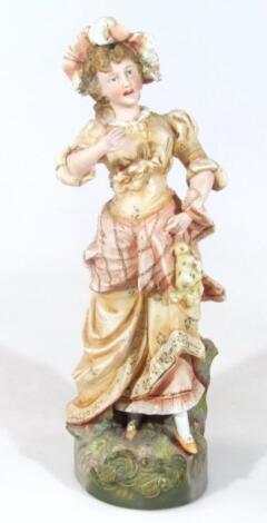 A 19thC Continental bisque porcelain figure of a lady