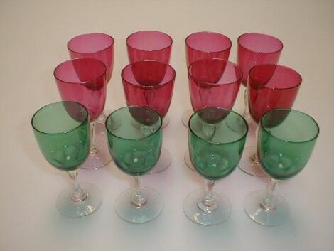 A set of eight cranberry glass wines