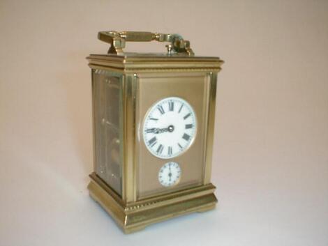 A French gilt brass repeater carriage clock