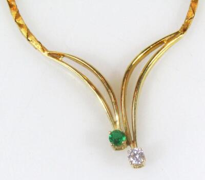 An emerald and diamond necklet