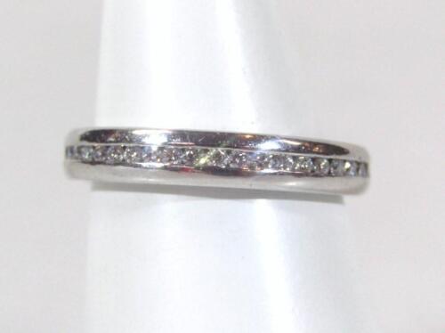 A platinum and diamond eternity ring