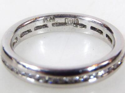 A platinum and diamond eternity ring - 2