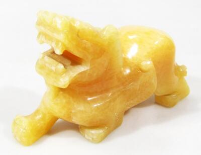 A Chinese jadeite figure of a temple dog