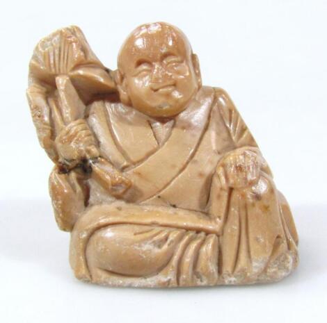 An early 20thC Chinese Qing period soapstone figure of a Hotei