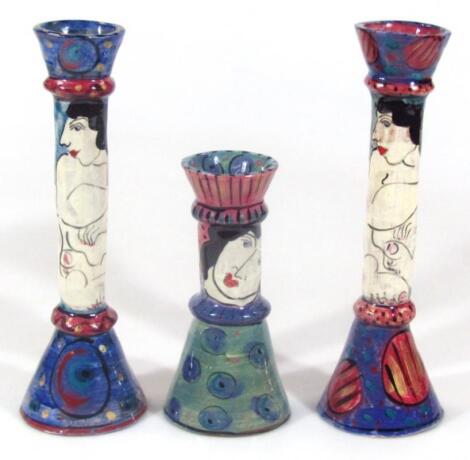 A pair of Karen Atherley candlesticks