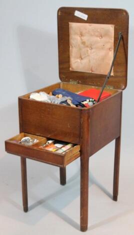 A mid 20thC oak stained freestanding sewing box