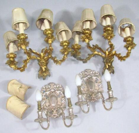 A pair of 20thC rococo style gilt metal wall sconces