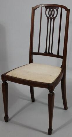 An Edwardian mahogany bedroom chair