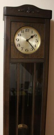 A mid 20thC long case clock