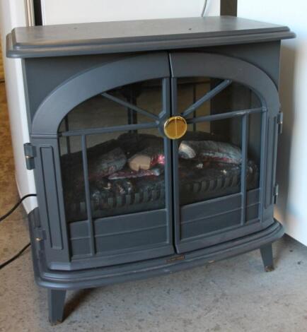 A modern metal cased stove style electric fire heater