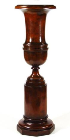 A Regency style stained mahogany urn centrepiece