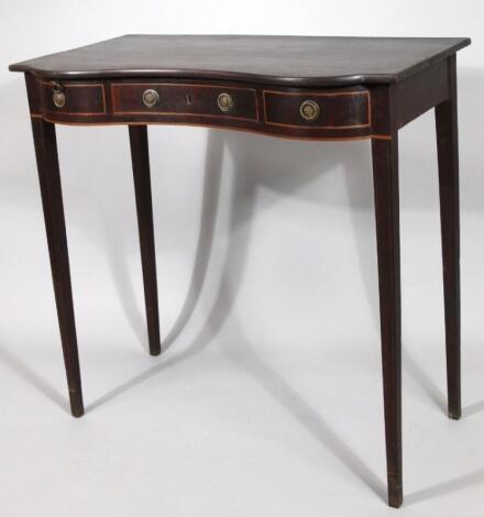 An Edwardian mahogany serving table