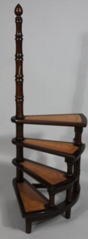 A set of modern mahogany finish library bed steps