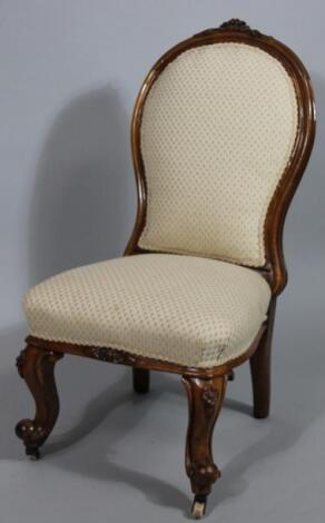 A Victorian walnut framed open chair