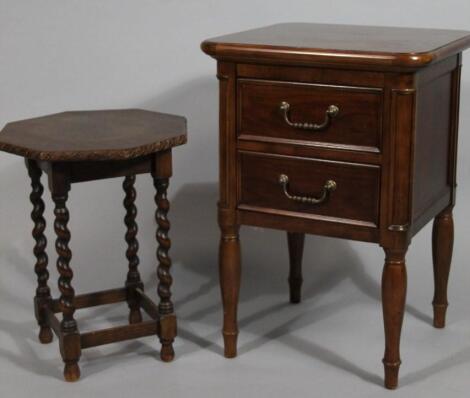 A 20thC walnut finish pedestal stool cabinet