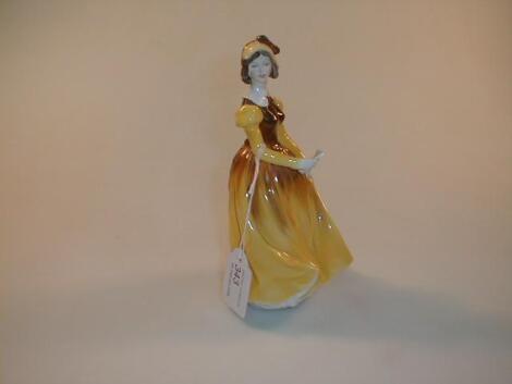 A Coalport figure, "A letter from a letter", 8£" high