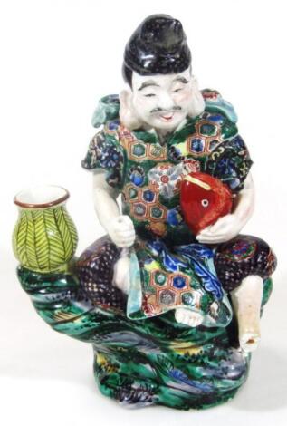 A Chinese porcelain Ming style figure of a gentleman