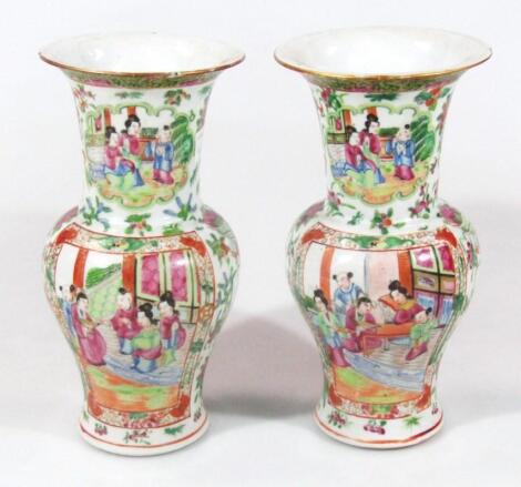 A pair of Cantonese pottery famille rose vases