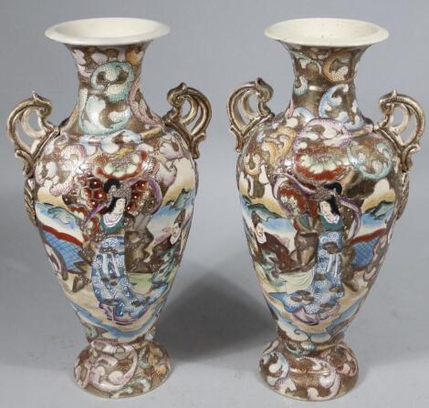 A pair of 20thC Japanese pottery vases