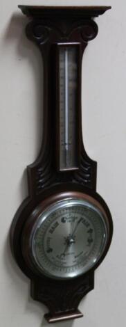 A 20thC two dial barometer and thermometer