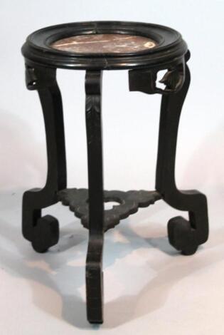 A late 19thC oriental hardwood jardiniere stand. (AF)