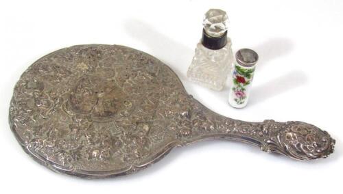 A heavily cast scrap silver hand mirror