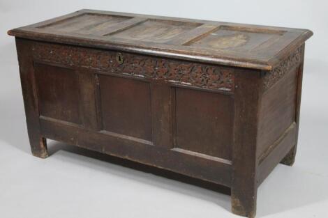 An 18thC three panelled oak coffer