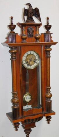 A late 19thC walnut cased Vienna wall clock