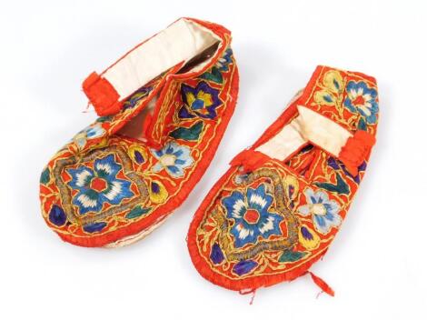 A pair of Chinese silk work shoe covers and bases