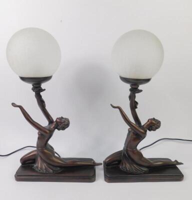 A pair of Crosa Art Deco style bronzed plaster table lamps modelled as kneeling women