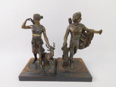 A pair of spelter late 19thC figures modelled as Diana and Apollo