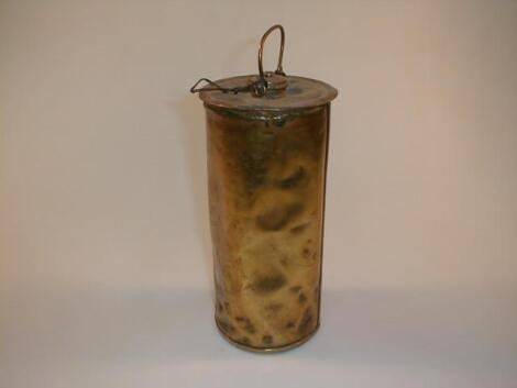 A brass foot warmer, possibly matching, made by P