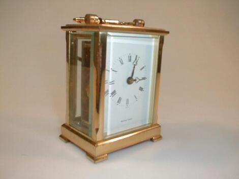 A gilt brass carriage timepiece