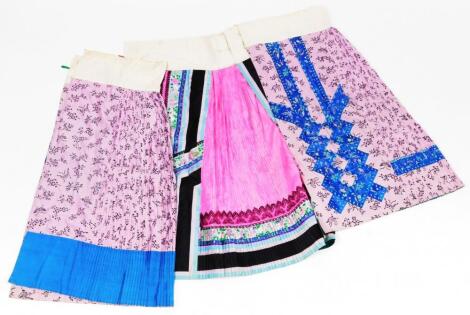 Various oriental silk skirts and material