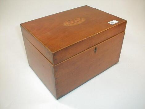 An early 19thC mahogany box with oval shell inlay